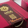 Caja x 4 Unidades 50gr de Trufas Mida Cacao 65% con Arándanos y Almendras.